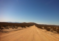 UltimateGraveyard Mojave Desert Main Road Leading To Property - Facing South