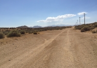 UltimateGraveyard Mojave Desert Dirt Road Parallel to Train Tracks